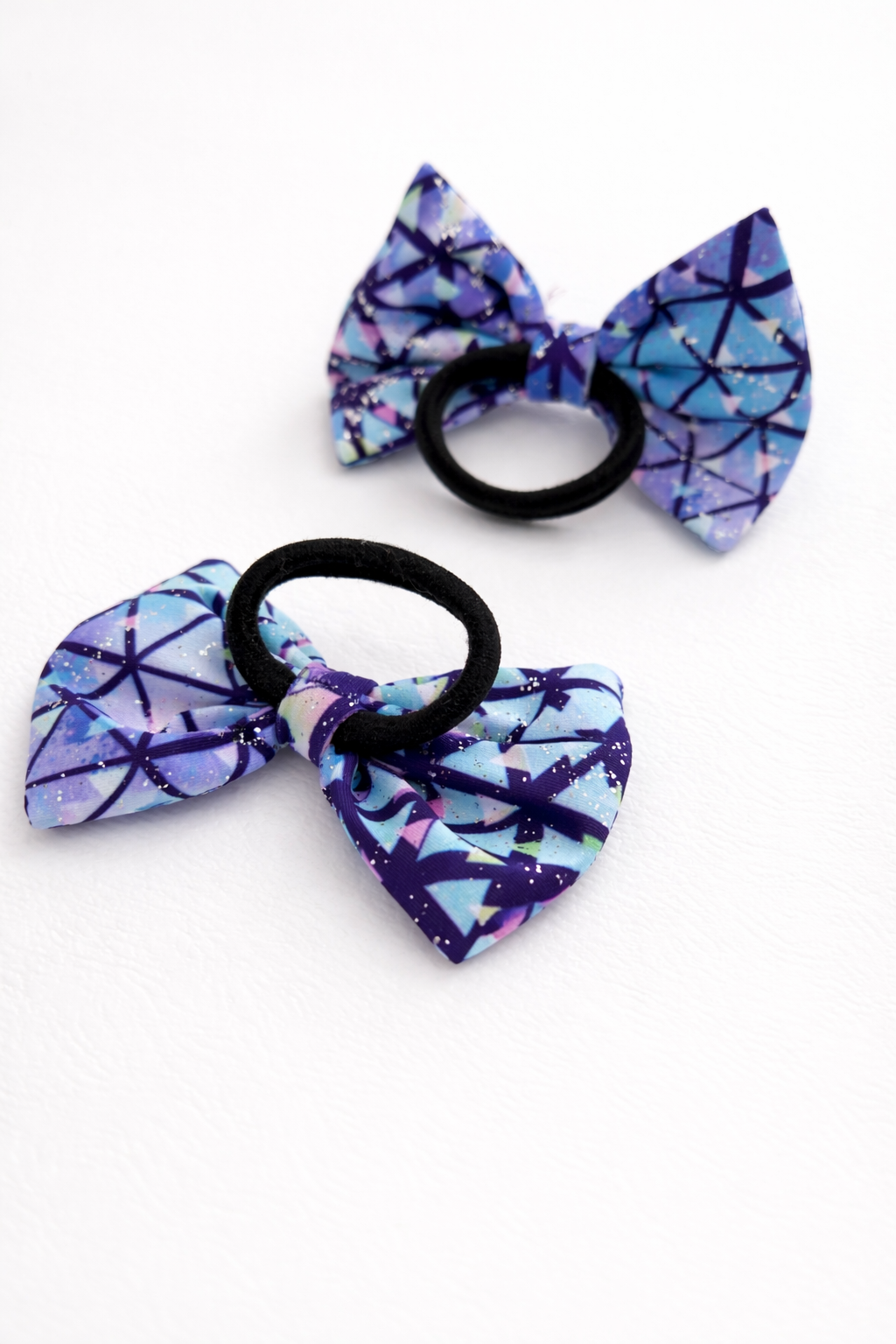SCRUNCHIES_LAVENDER_1.2 Kids bow hair tie with a lavender bow made from soft lycra fabric