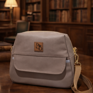 Nina eco leather crossbody bag with front flap pocket and magnetic closure in beige colour