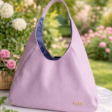 Twila handmade eco leather hobo bag in soft lilac colour, spacious A4 everyday shoulder bag with magnetic closure